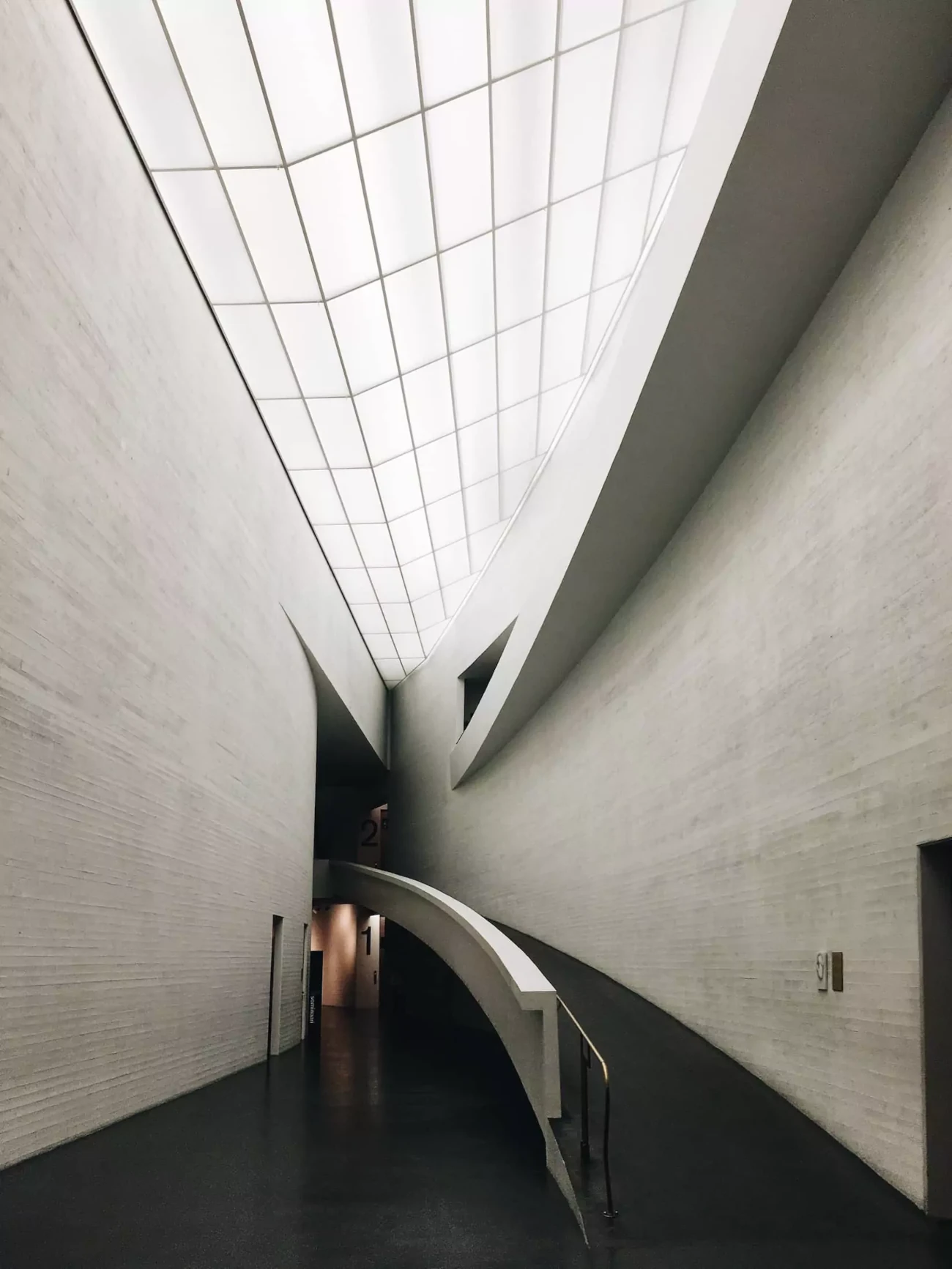 A ramp along a curved wall in the Kiasma Museu, Helsinki, Finland